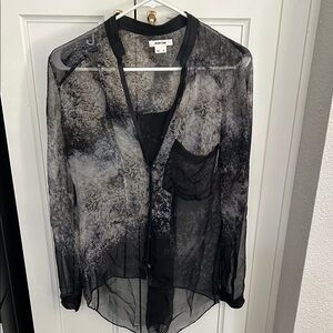 Helmut Lang

Beautiful sheer black gray blouse. Button down.

Size: small